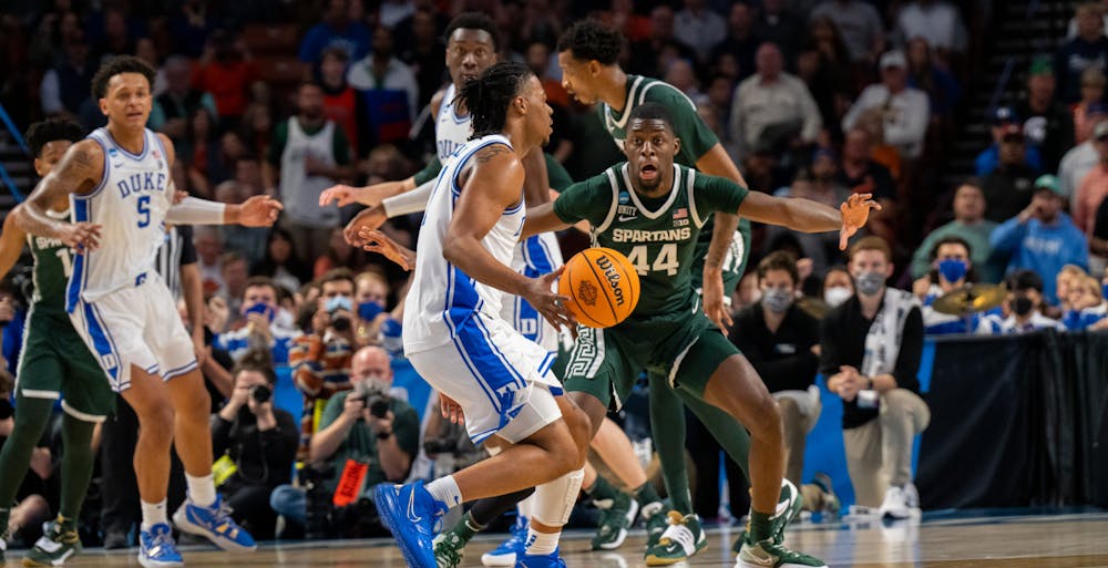 <p>Trevor Keels (1) is defended by Gabe Brown (44) during Duke&#x27;s victory over Michigan State on March 20, 2022.</p>