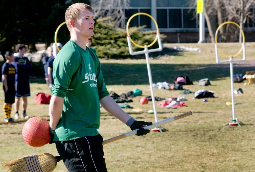 International relations sophomore and Quidditch chaser looks to throw a Bludger at the opposing University of Michigan team during the match on Saturday, Feb. 19 at the rock on Farm Lane. The MSU Quidditch Traveling team consists of 40 members. Lauren Wood/The State News