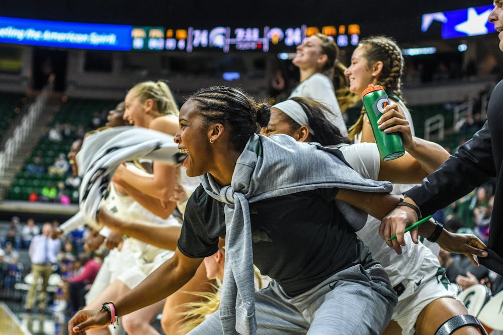 The Spartans celebrate during the game against Morehead State at Breslin Center on Dec. 15, 2019. The Spartans defeated the Eagles, 93-48.