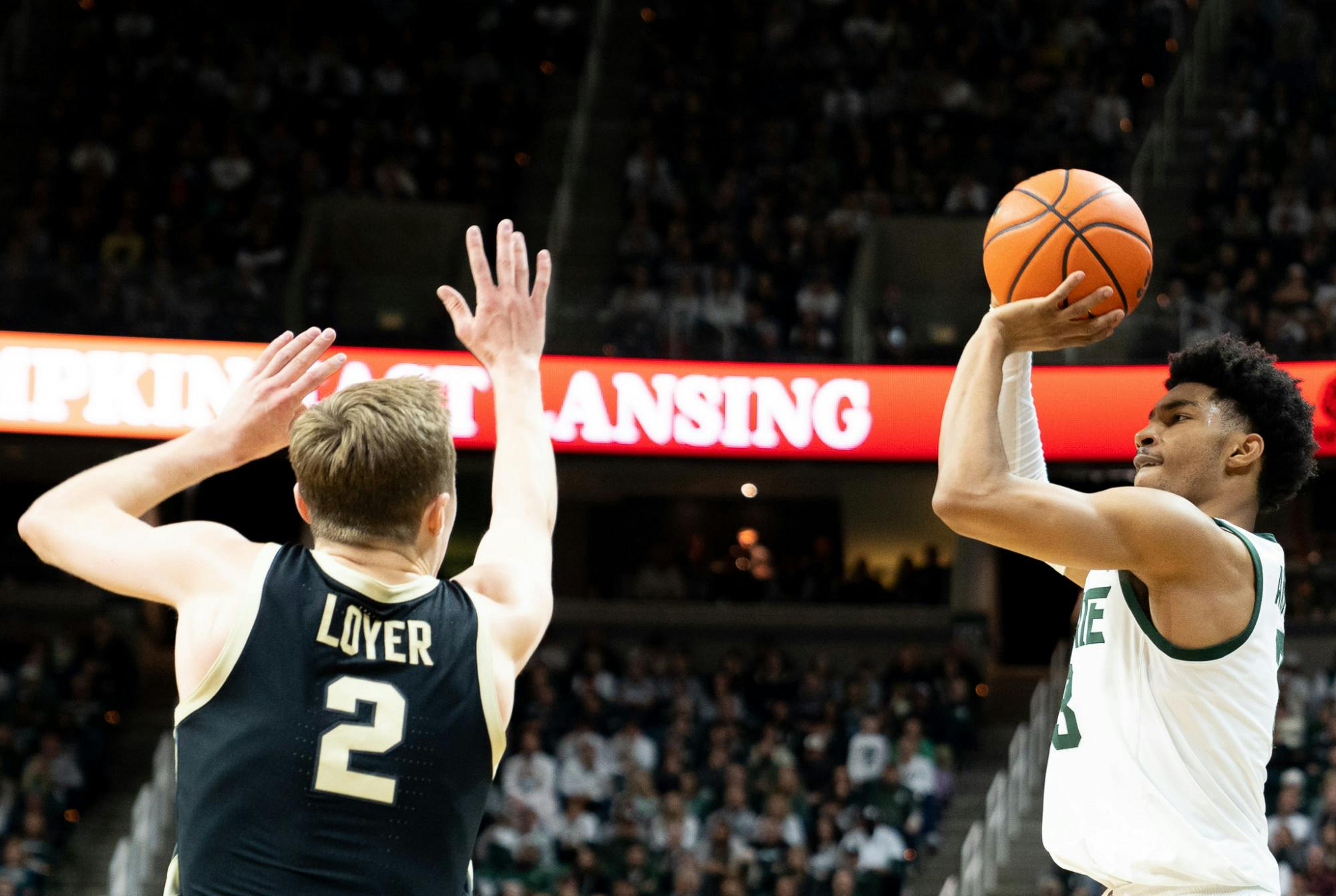 Sophomore guard Jaden Akins (3) attempts to score against Purdue University during a game at Breslin Center on Jan. 16, 2023. The Spartans fell to the Boilermakers with a score of 64-63. 