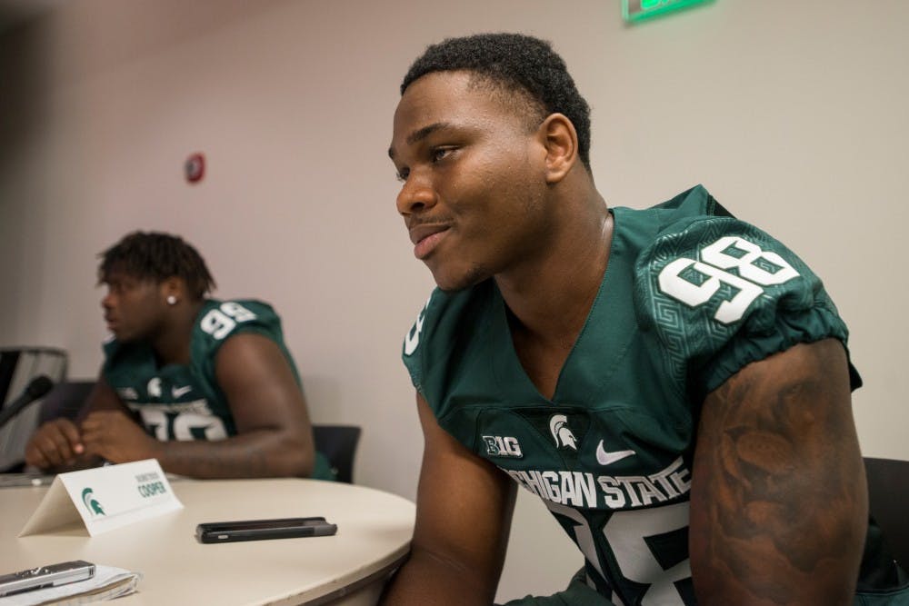 Junior defensive end Demetrius Cooper (98) responds to a question from the media during Media Day on Aug. 8, 2016 at Spartan Stadium. Media Day allowed for the media to converse with the team's coaches and players.