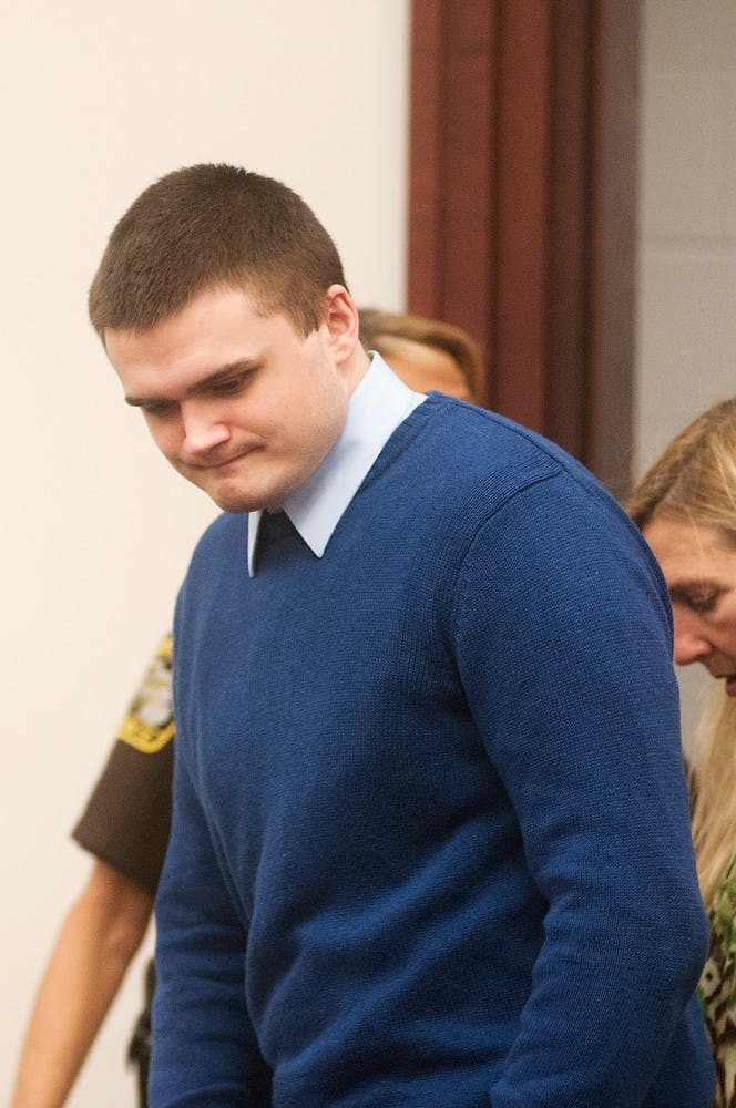 	<p>Connor McCowan enters the courtroom Oct. 15 before the verdict at Ingham County County Circuit Court in Lansing. McCowan was found guilty of the Feb. 23 stabbing of <span class="caps">MSU</span> student Andrew Singler. Georgina De Moya/The State News</p>