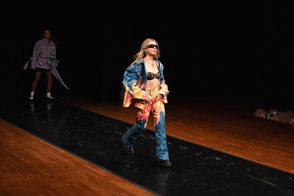 <p>Kaitlyn Keele walking for the VIM fashion show, 'Dawn 'Til Dusk', at the Wharton Center on Mar. 14, 2024.</p>