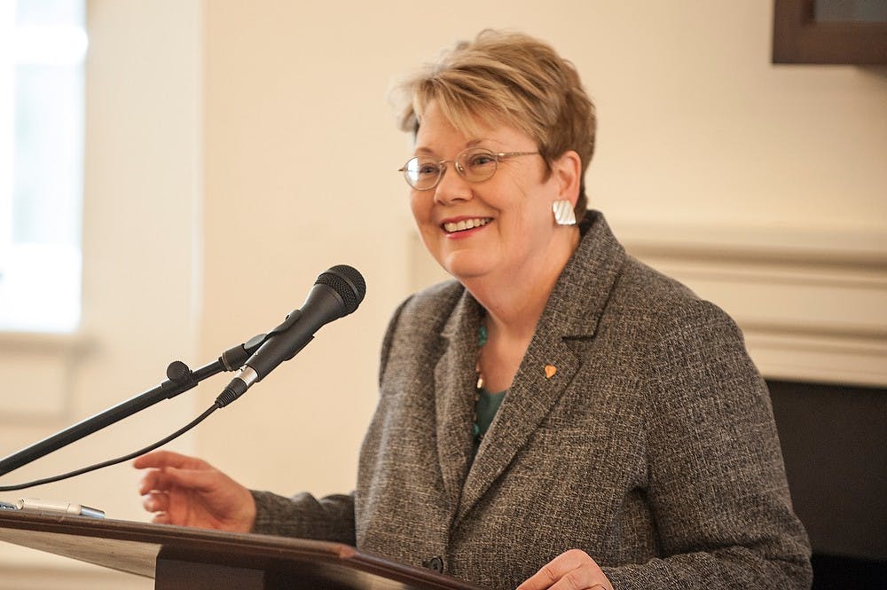 <p>Teresa Sullivan addresses the Virginia Senate Finance Committee on April 1, 2014 in Richmond, Virginia. Photo Credit: Marshall Bronfin</p>