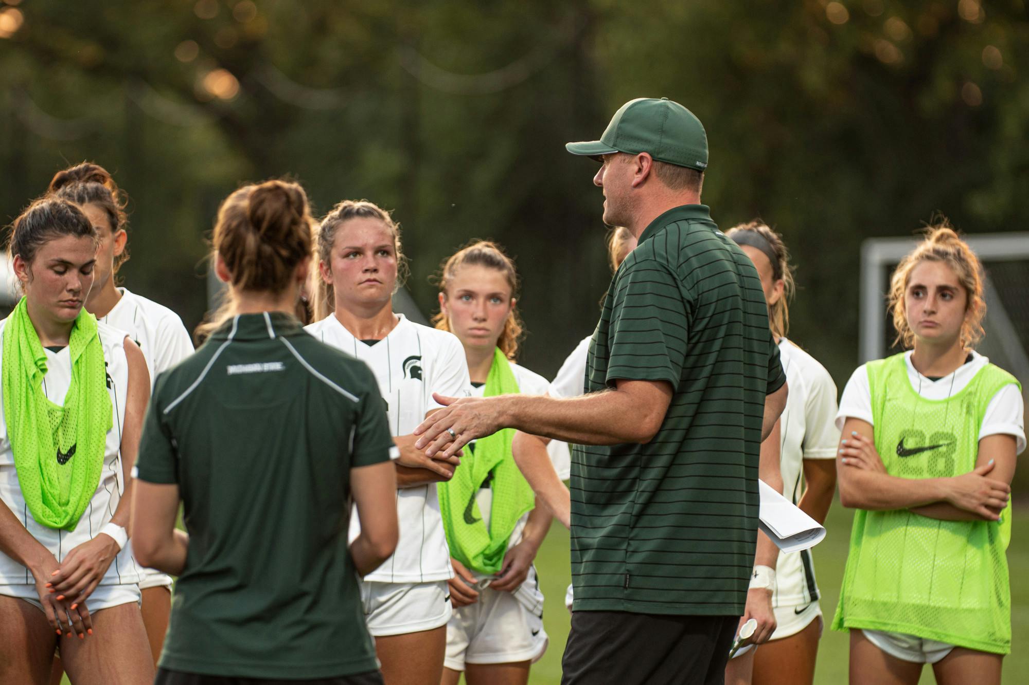 Michigan State Head Coach Jeff Hosler addresses his team, photo courtesy of MSU Athletics and Maria Babcock.