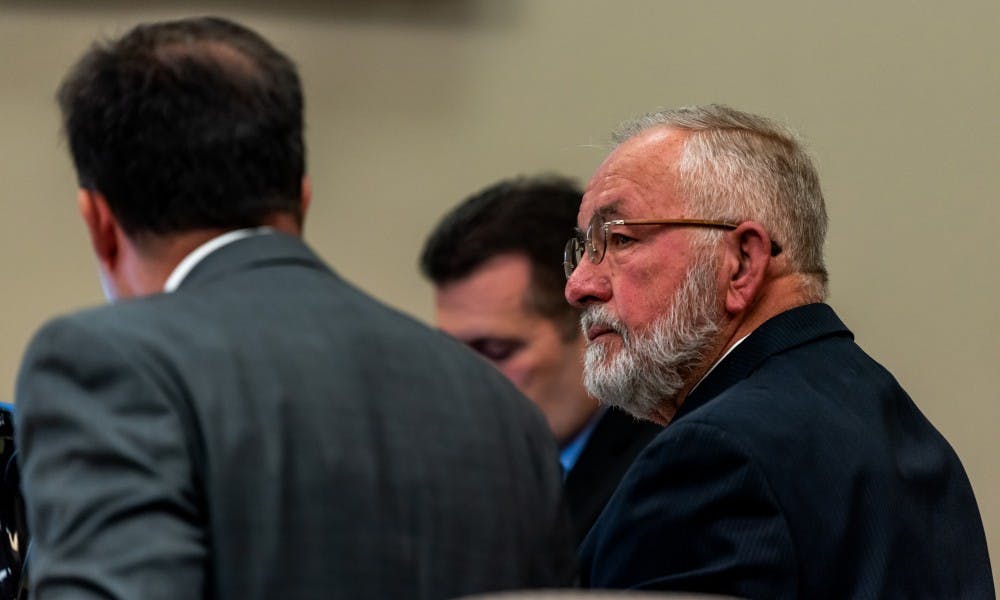 <p>Dr. William Strampel (right), former dean of the MSU College of Osteopathic Medicine, on trial at the Ingham Count Circuit Court on June 4, 2019.</p>