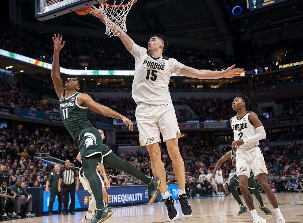 <p>Sophomore guard A.J. Hoggard (11) takes a shot for the Spartans as Michigan State took on the Purdue Boilermakers in the semifinals of the B1G tournament at Gainbridge Fieldhouse in Indianapolis. - March 12, 2022</p>