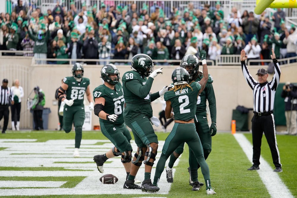 <p>Michigan State players celebrate in the end zone after a touchdown in the first half against Nebraska at Spartan Stadium on Nov. 4, 2023.</p>