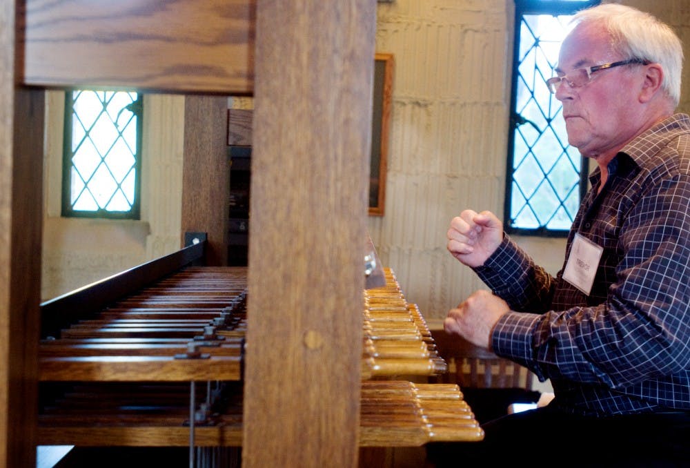 	<p>Bournville, England resident Trevor Workman plays the carillon for the first Muelder Summer Carillon Recital of the year Wednesday at Beaumont Tower. Recitals will be held every Wednesday through Aug. 3. </p>