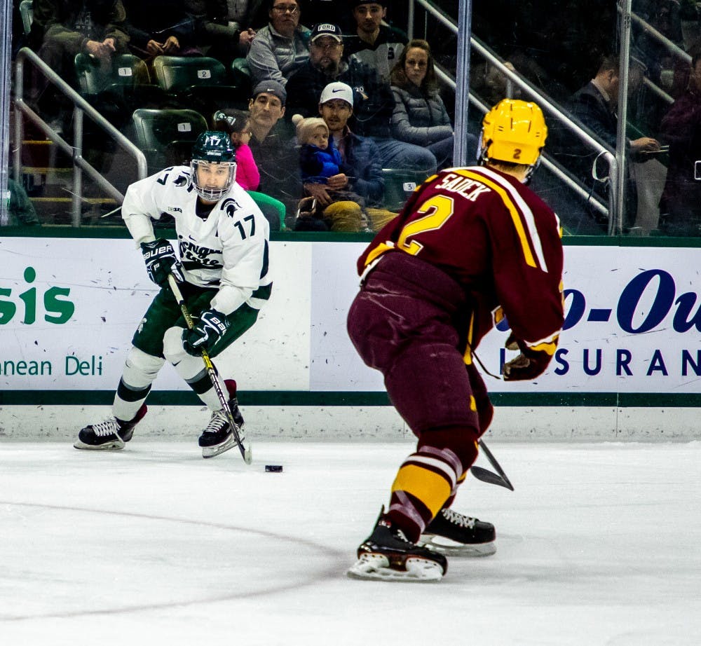 Junior wing Taro Hirose (17) looks to make a crossing pass during the game against Minnesota on Jan. 20, 2019. The Spartans are tied with the Golden Gophers 1-1 at the end of the first period.