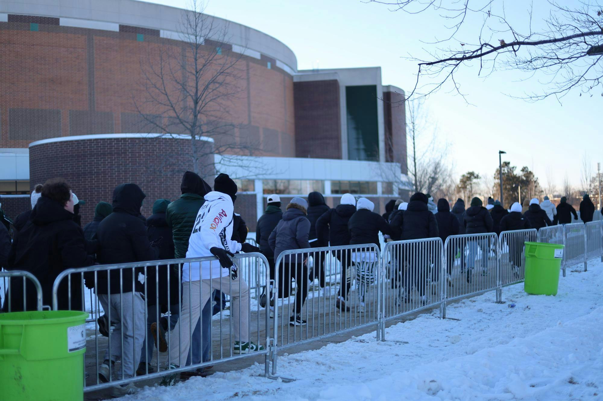 <p>Students run to the entrance of the Breslin Center ahead of the Michigan State vs. University of Michigan rivalry basketball game on Friday, Jan. 30, 2026.</p>