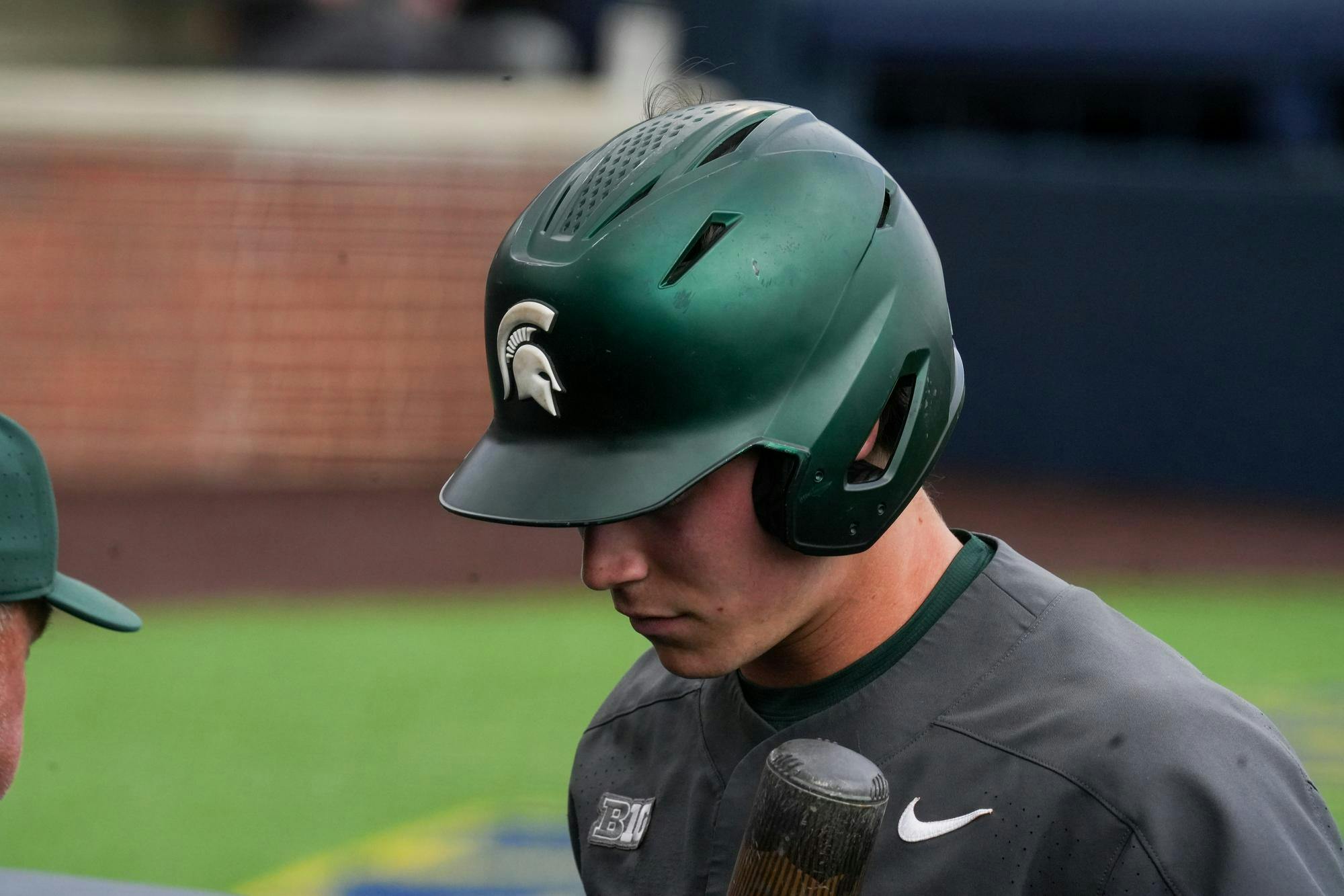 Michigan State sophomore Ryan McKay (1) walks off the field after losing to in-state rivals Michigan on April 26, 2025. The Spartans lost to the Wolverines in the second game 9-2.