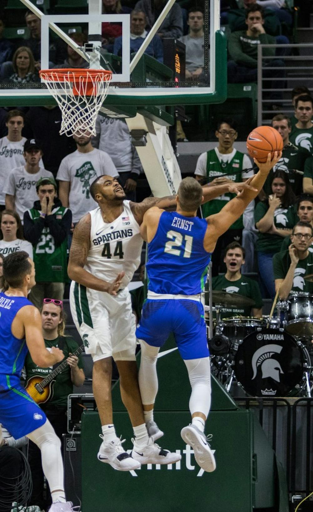 Junior forward Nick Ward (44) blocks a shot during the game against Florida Gulf Coast University at Breslin Center on Nov. 11, 2018. The Spartans defeated the Eagles, 106-82.