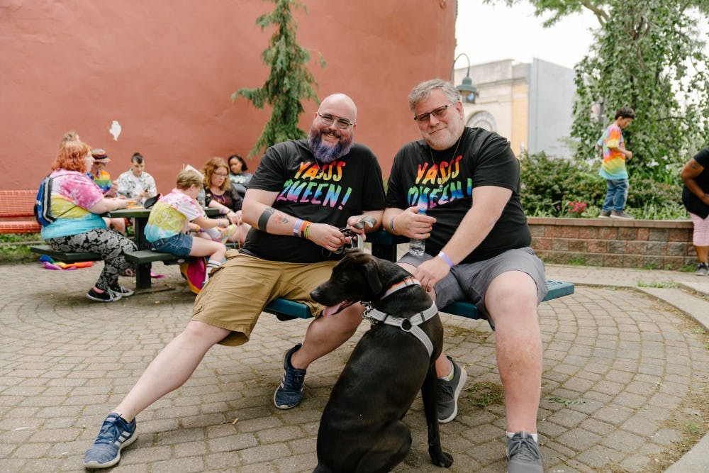 <p>Lansing residents David Edmonds and Brian Martin at Pride in Old Town on Saturday, June 15, 2019. </p>