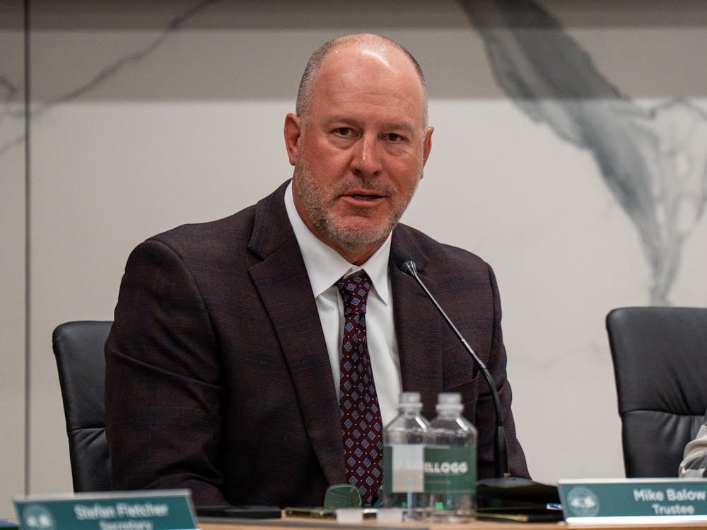 <p>Michigan State University Trustee Mike Balow addresses the board at Hannah Administration Building in East Lansing, Michigan on Friday, April 10, 2026.</p>