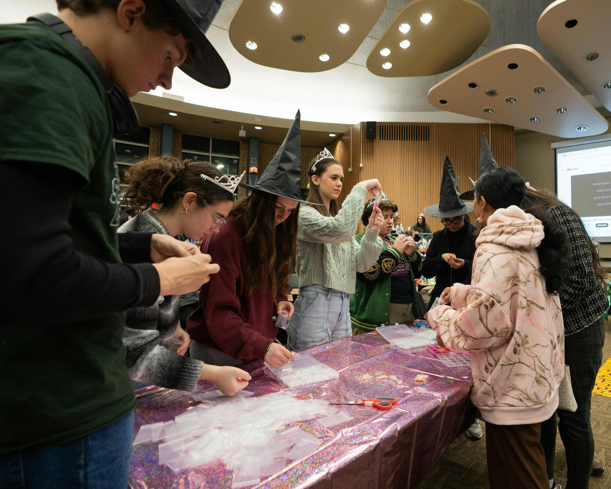 <p>Michigan State students make friendship bracelets inspired by "Wicked" in Erickson Hall in East Lansing, Michigan on Wednesday, Nov. 19, 2025.</p>