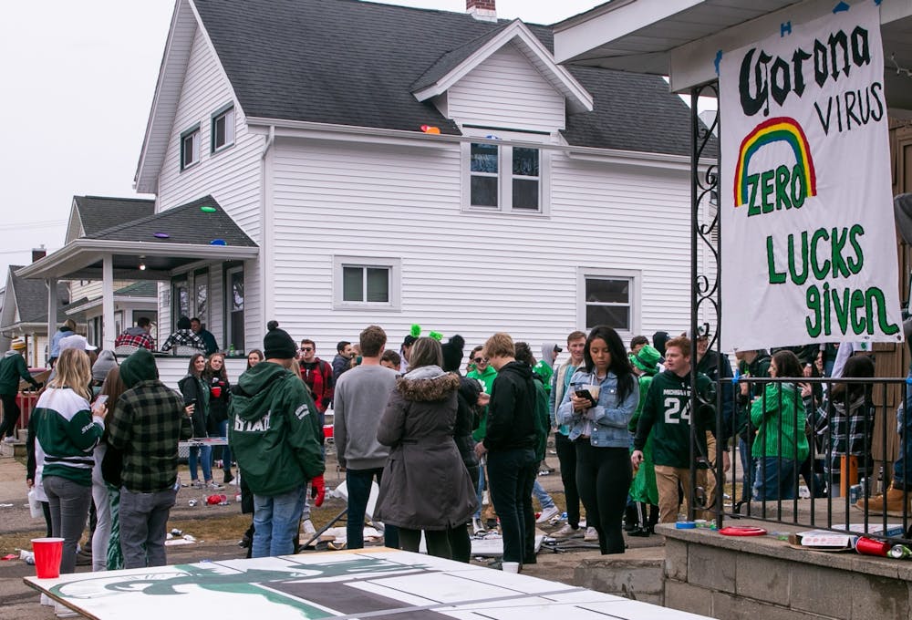 Students party at housing near MSU on the Saturday before St. Patrick's Day despite health warnings related to COVID-19.