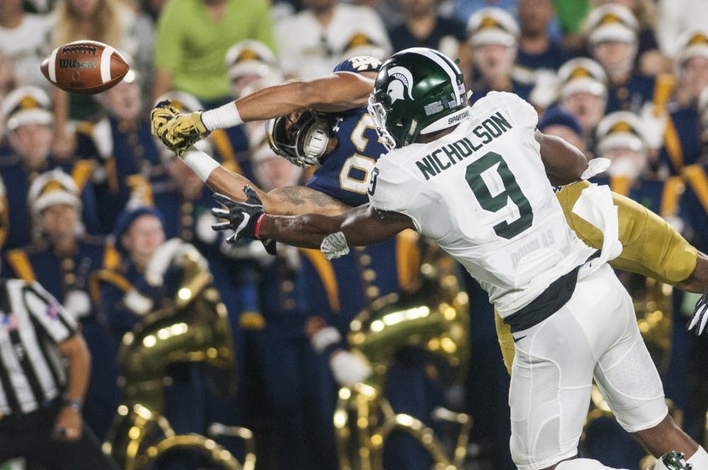 Junior safety Montae Nicholson (9) covers Notre dame wide receiver Chase Claypool (83) as he dives for the football during the against Notre Dame on Sept. 17, 2016 at Notre Dame Stadium in South Bend, Ind.