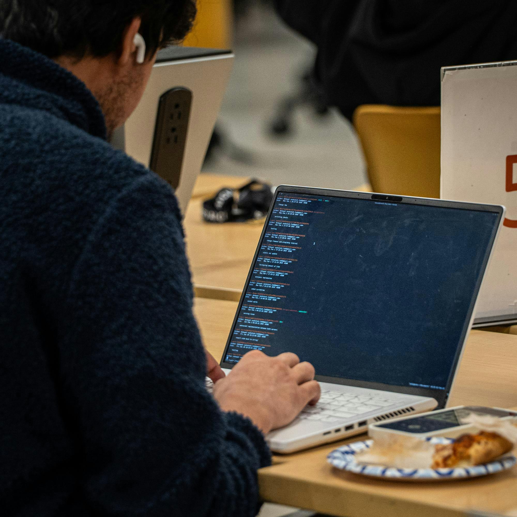 <p>An MSU student works on a coding project during the AI club meeting in the STEM Teaching and Learning Facility in East Lansing, MI on Feb. 2, 2026.</p>