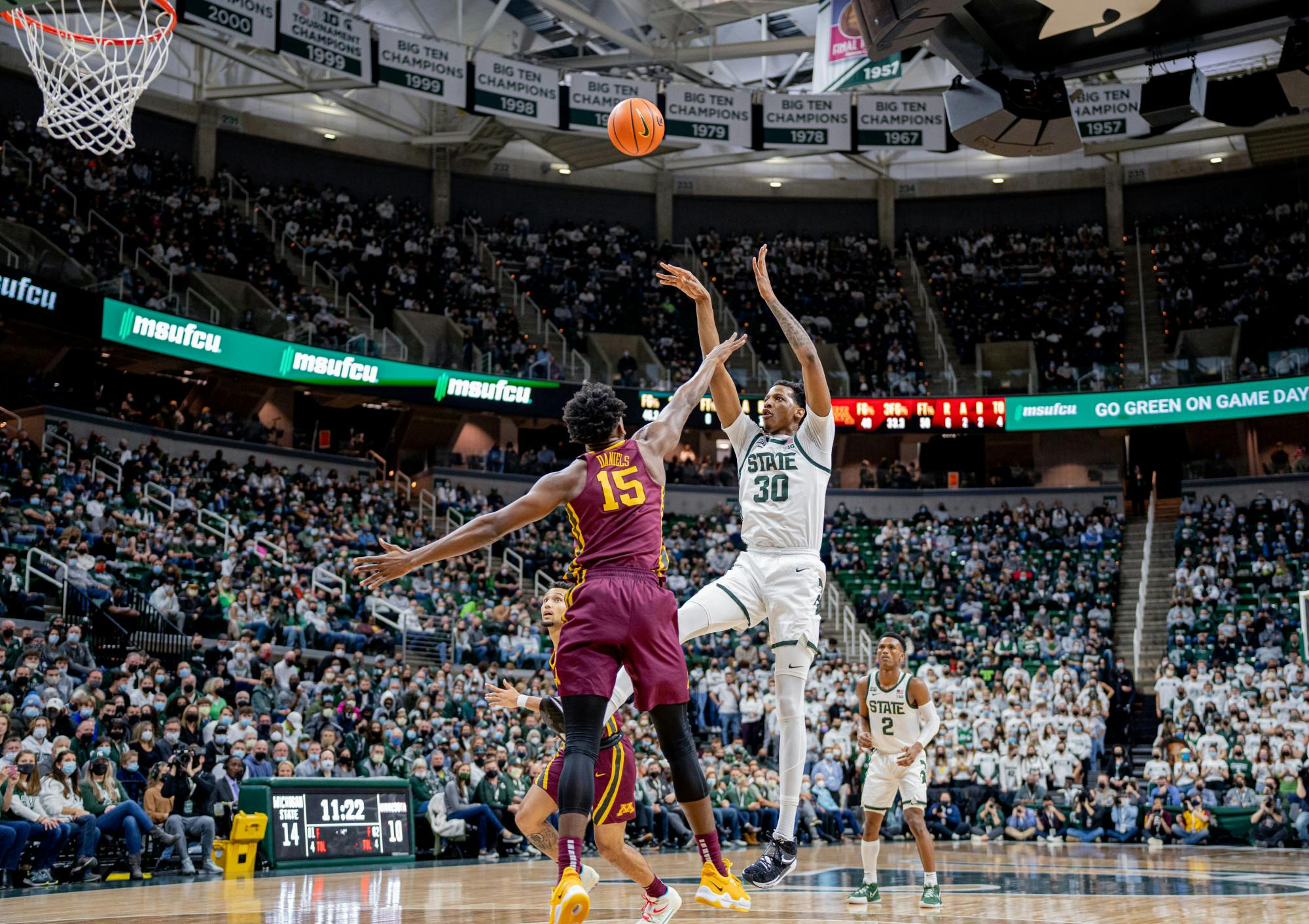 <p>Senior forward Marcus Bingham Jr. shoots a mid-range jumper during the Spartans&#x27; 71-69 win against Minnesota on Jan. 12, 2022.</p>