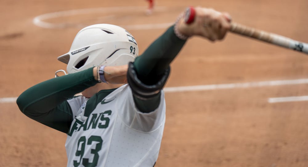 Shortstop Kayleigh Roper warms up in the on deck circle while waiting for her next at bat. MSU lost to Ohio State 2-1 on April 3, 2022. 