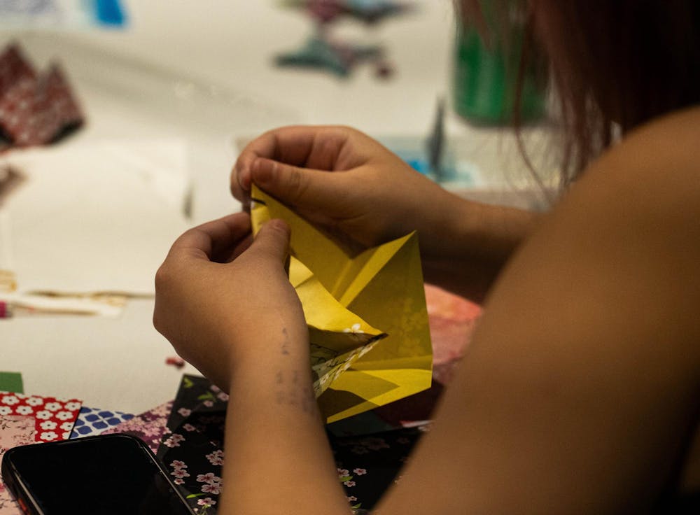 <p>An attendee folding oragami at the UAB Jaws Origami event at the MSU Union in East Lansing, on Jan. 31st, 2026</p>