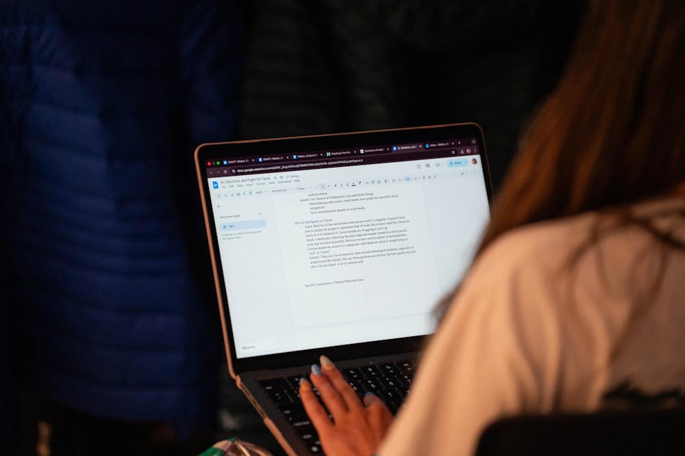 Students taking notes during the AI, Elections, and the Fight for Facts Event at the MSU Museum in East Lansing, on March 19 2026.