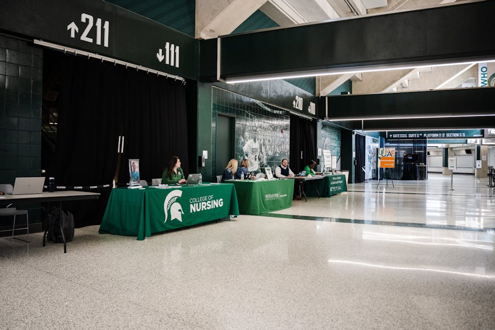 Student researchers gather and present at the URAF conference at the Breslin Center on Apr. 14, 2023.