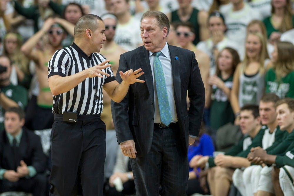 Head coach Tom Izzo talks to a referee during the game against Wisconsin on Feb. 18, 2016 at Breslin Center. The Spartans defeated the Badgers, 69-57.