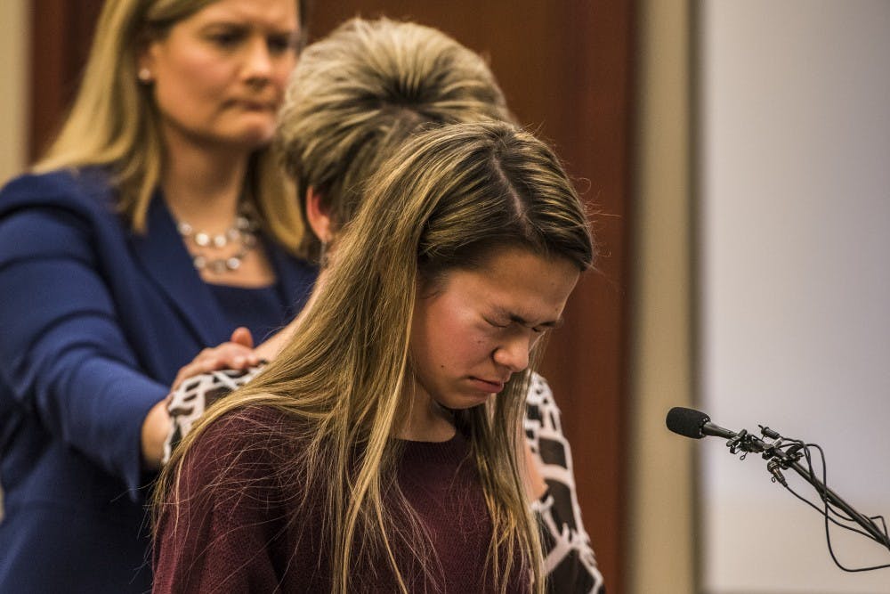 Chelsea Zerfas fights away tears during her statement on the fourth day of ex-MSU and USA Gymnastics Dr. Larry Nassar's sentencing on Jan. 19, 2018 at the Ingham County Circuit Court in Lansing. (Nic Antaya | The State News)