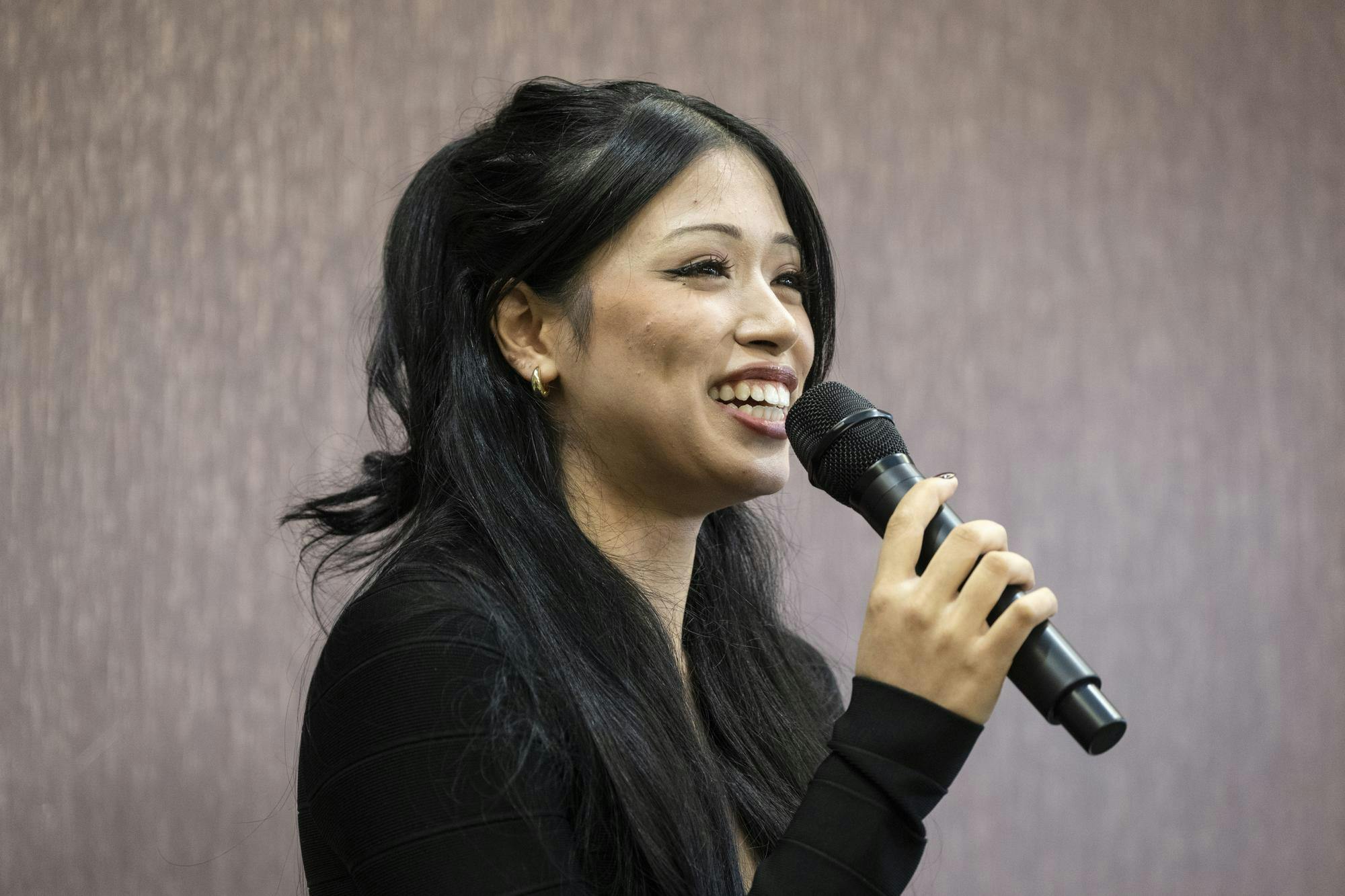 Kaya Chakabortty, a former MSU student, responds to audience questions at the “Beauty Standards in Japan” event held at the International Center on Thursday, Nov. 13, 2025.