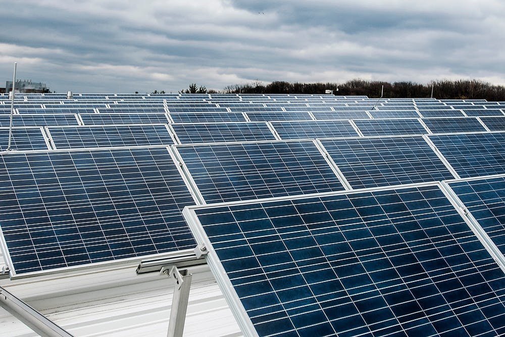 	<p>Solar panels are pictured Friday, April 19, 2013, on the roof of the <span class="caps">MSU</span> Recycling Center, 468 Green Way. <span class="caps">MSU</span>&#8217;s push for a greener campus includes many different services, from recycling to alternative energy sources. Adam Toolin/The State News</p>