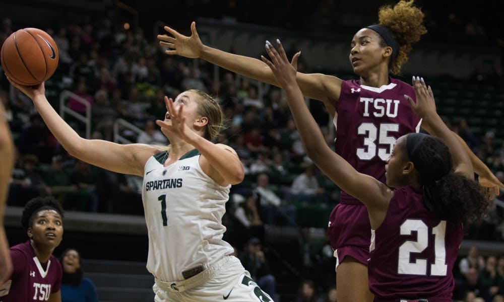 Freshman guard Tory Ozment (1) takes a shot during the game against Texas Southern University at Breslin Center on Dec. 2, 2018. The Spartans defeated the Tigers, 91-45.