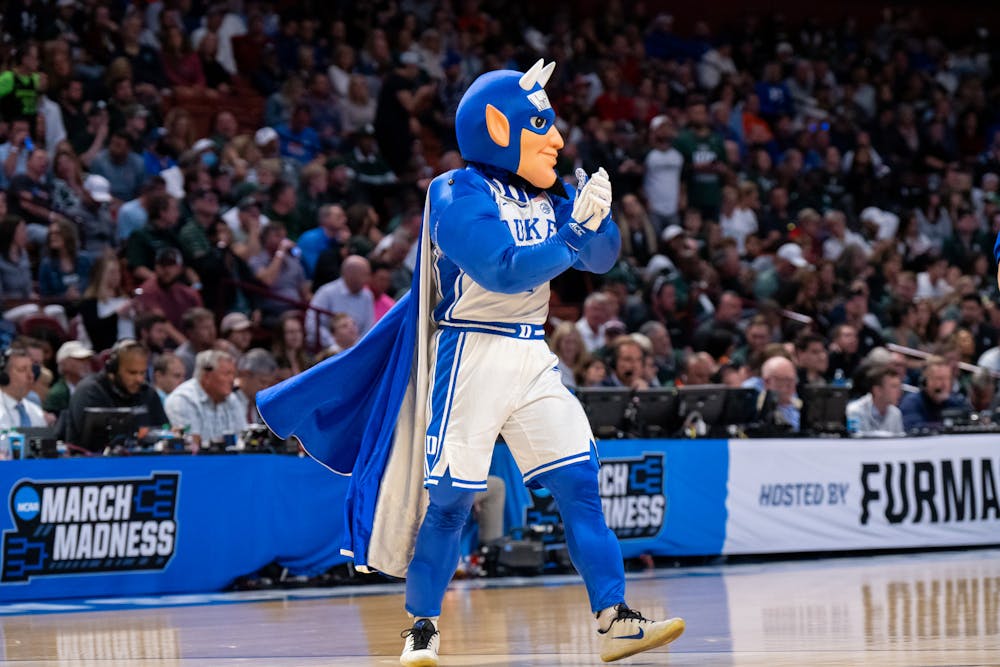 <p>Duke&#x27;s Blue Devil mascot claps along to a song during a timeout during Duke&#x27;s victory over Michigan State on March 20, 2022.</p>