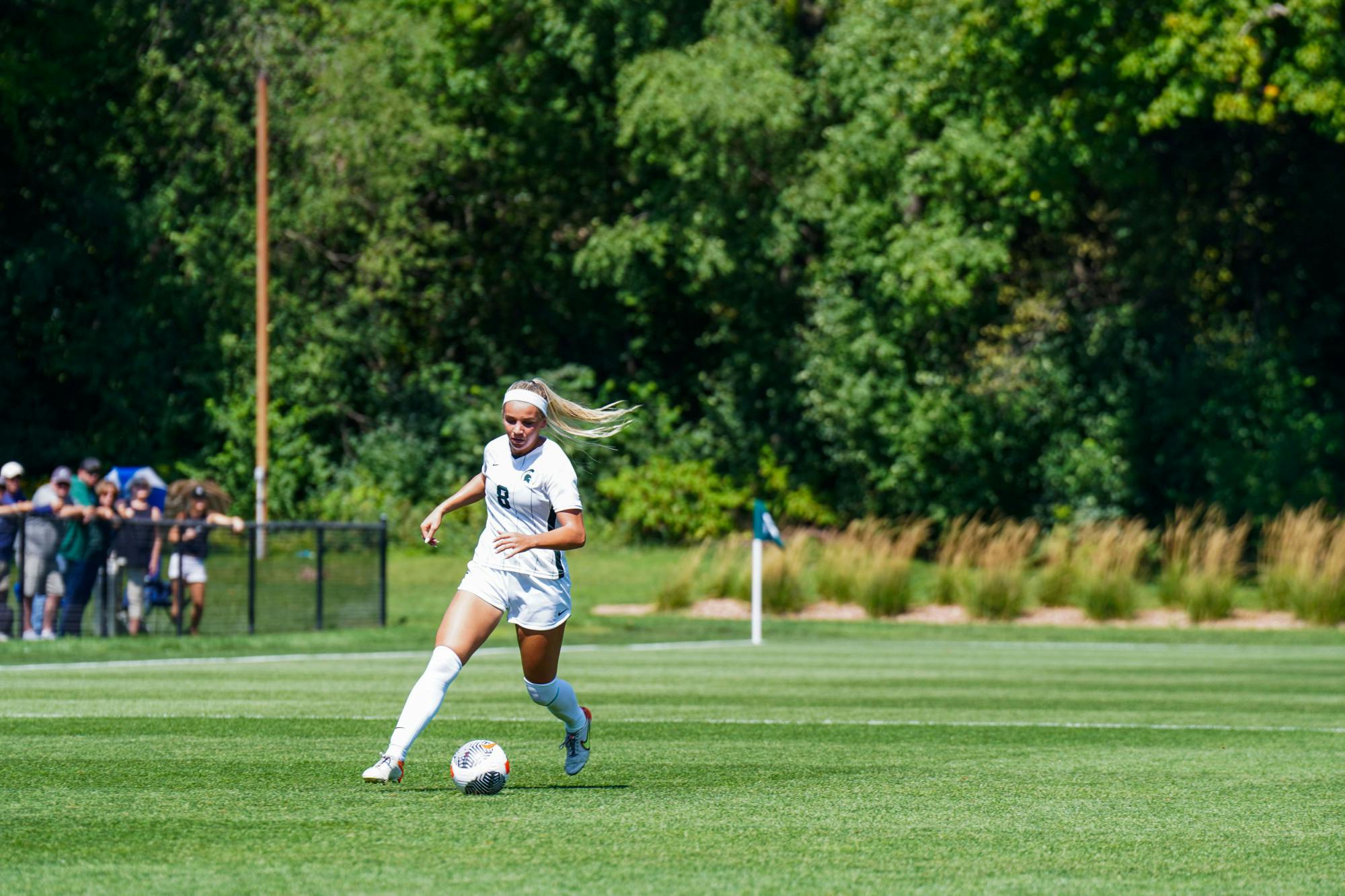 <p>Michigan State women's graduate defender Reagan Cox with the ball against University of Notre Dame at DeMartin Soccer Complex on Sept. 3, 2023. The Spartans lost to the Fighting Irish 2-1.</p>