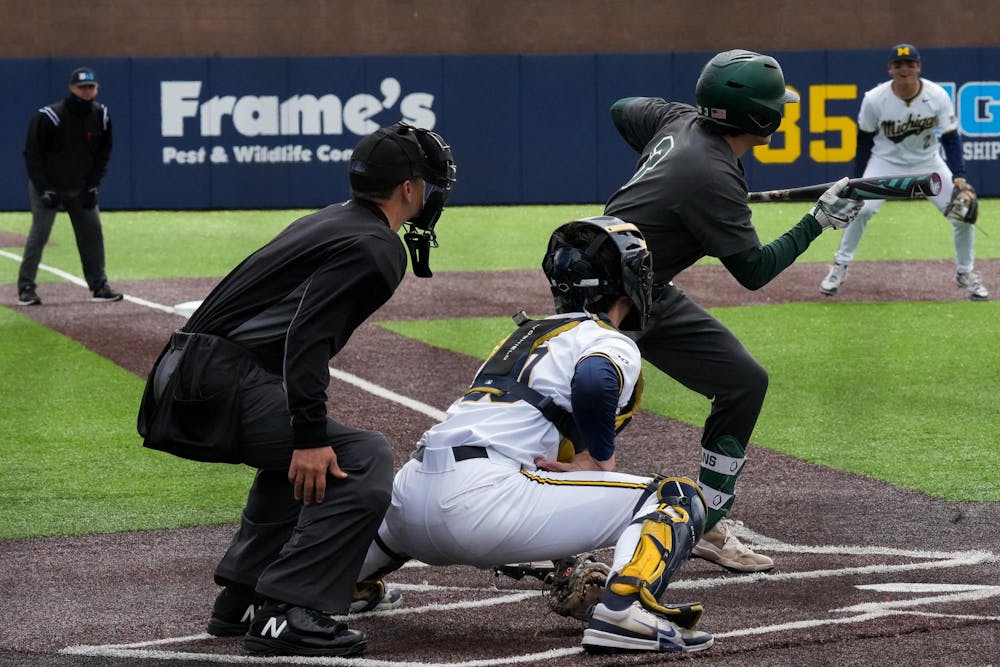 Michigan State freshman Dayton Murphy (3) attempts to bunt the ball to advance the runners on base on April 26, 2025. 