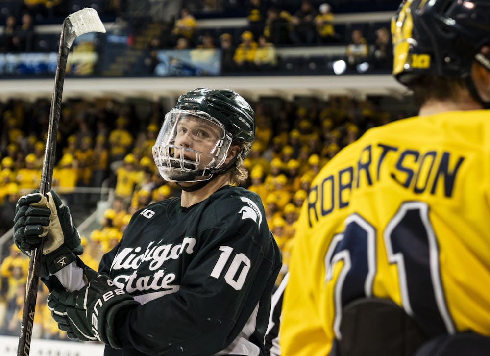 <p>Michigan State junior forward Tommi Männistö (10) holds up his hockey stick between points at the Yost Ice Arena in Ann Arbor, Mich. on Dec. 6, 2025.</p>