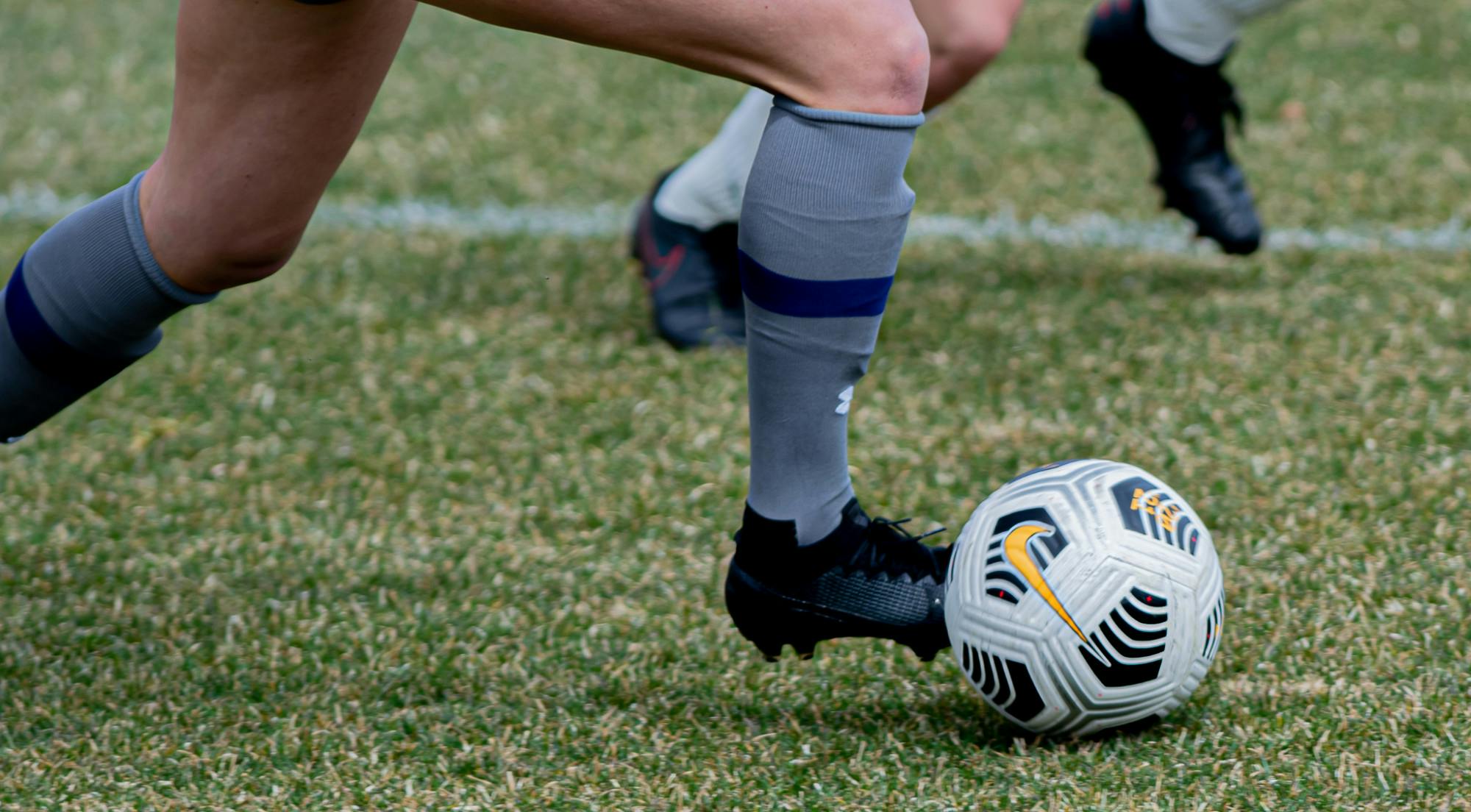 <p>A Northwestern player moves with the ball against the Spartans on March 25, 2021.</p>