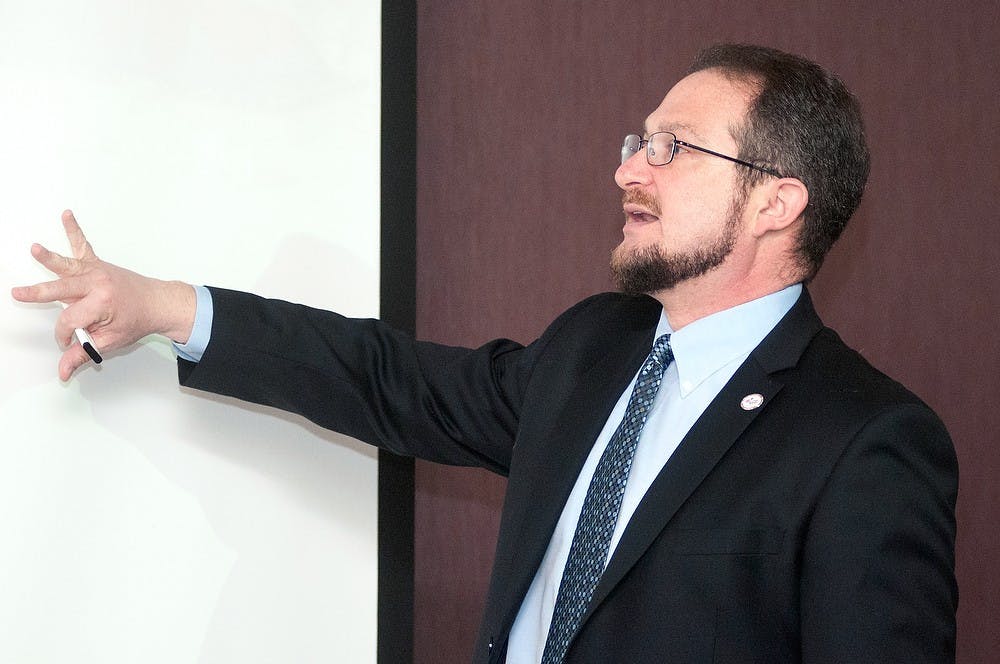 	<p><span class="caps">MSU</span> associate professor Ethan Segal of the department of history talks about the effects of the earthquake, tsunami, and nuclear power plant crisis that devastated Japan two years ago March 18, 2013, at the International Center. The efforts at recovery and prospects for the future were also discussed. Katie Stiefel/The State News</p>