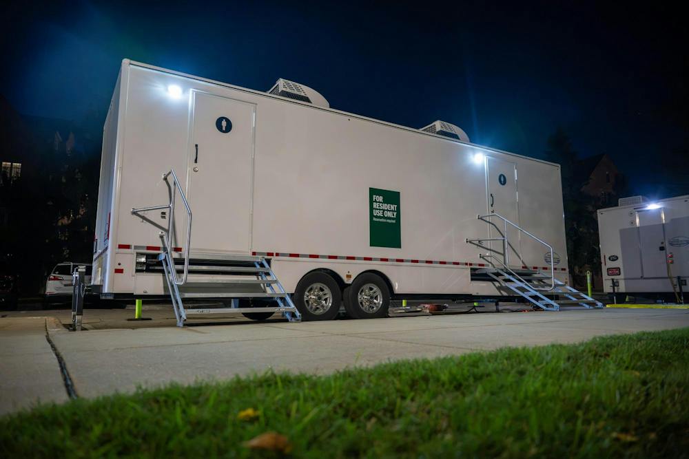 <p>Mobile shower units are brought on campus following a campuswide power outage at Michigan State University on Delta Ct in East Lansing, Mich., on Wednesday, Sept. 23, 2026. MSU announced mobile showers would be available for students in West Circle as hot water and steam restoration continues across campus.</p>