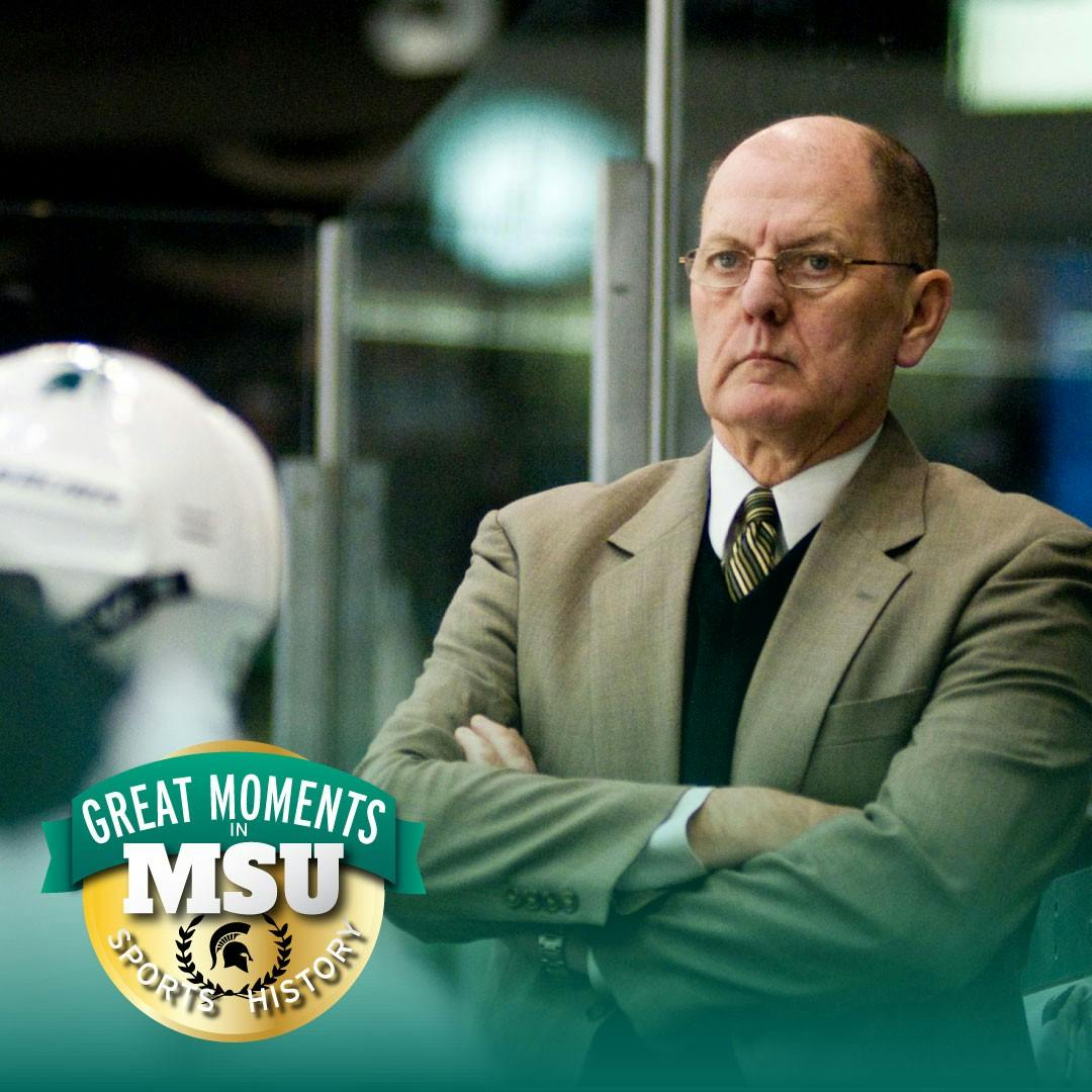 Despite his team being ahead, then-coach Rick Comley remains composed as his players score three goals in the first period Feb. 12, 2011 at Munn Ice Arena. State News file photo. Design by Daena Faustino.