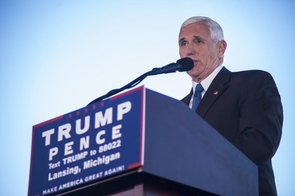 Republican vice presidential nominee Mike Pence gives a speech on Nov. 4, 2016 at the Capital Region International Airport in Lansing, Mich.