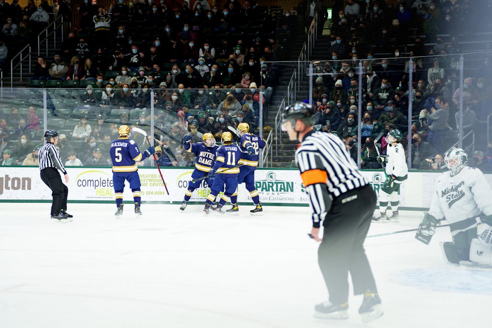<p>Notre Dame players celebrating after freshman Justin Janicke scores the first goal making it 1-0 Notre Dame leads on Feb. 19, 2022. Spartans lost 4-2 against Notre Dame.</p>