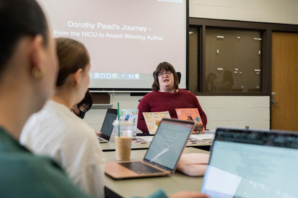 <p>Author Dorothy Paad speaks to a journalism class at Michigan State University on Wednesday, March 20, 2024. Paad has written several children's books about her experience with cerebral palsy and how she's overcome challenges throughout her life.</p>