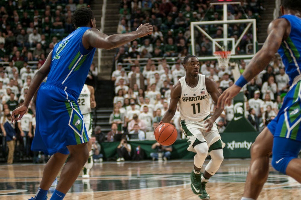 Junior guard Lourawls Nairn Jr. (11) dribbles the ball up the floor during a game against Florida Gulf Coast on Nov. 20, 2016 at Breslin Center. 