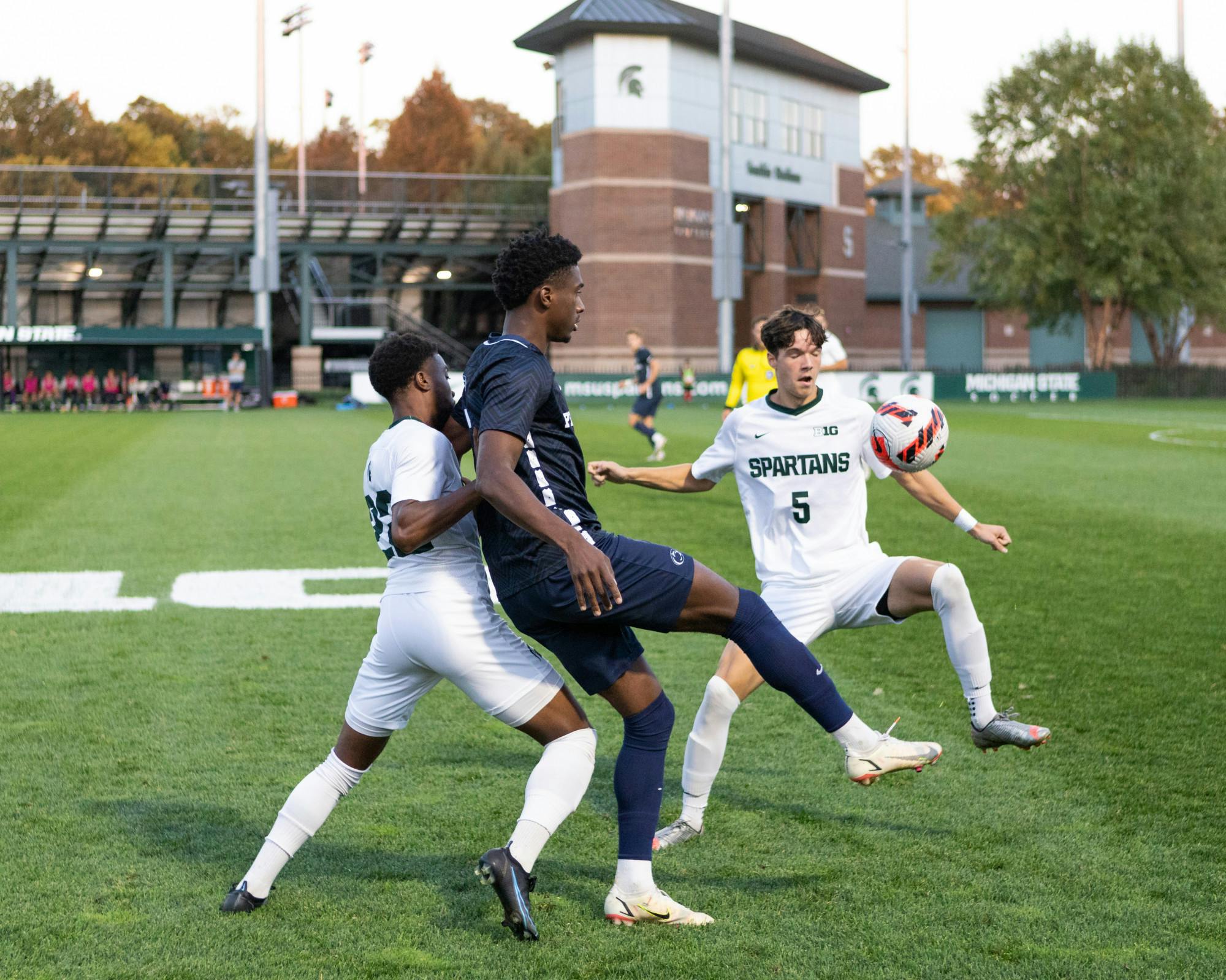 <p>Sophomore Midfielder Zack Zugay and Redshirt Junior Defender Will Perkins in a brief scuffle with a Pennsylvania State soccer player.</p>