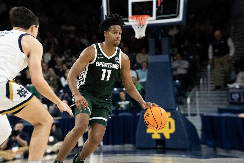 <p>Junior guard A.J. Hoggard dribbling the ball at the Notre Dame v. MSU game held at the Joyce Center on November 30, 2022. The Spartans lost to the Fighting Irish 52 -70.</p>