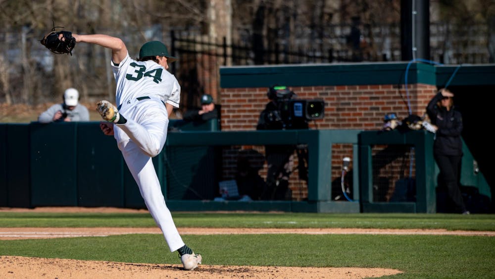 MSU sophomore right-hand pitcher Logan Pikur (34) pitches against Northwestern at MSU Jeff Ishiba Field on April 11, 2025.