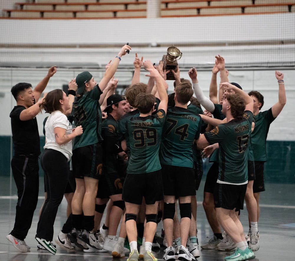 Michigan State University’s club dodgeball team celebrates winning the Michigan Dodgeball Cup for the fifth consecutive year at Demonstration Hall on Feb. 21, 2026.