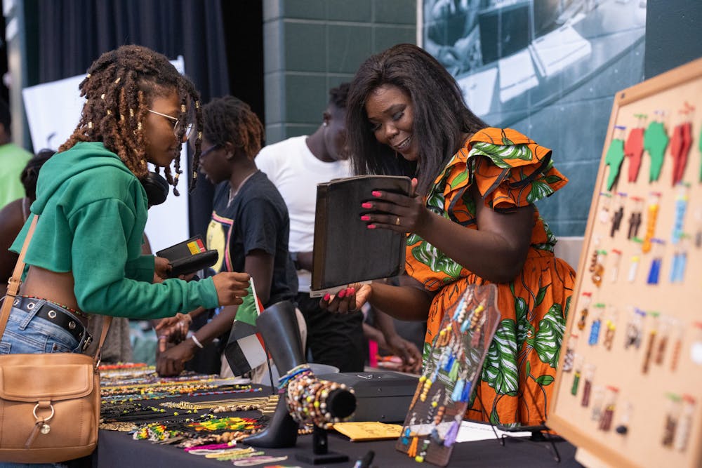 <p>Vendors market their products, all coming from black-owned businesses during the 2nd Annual Juneteenth celebration at the Breslin Student Events Center on June 17, 2022. </p>